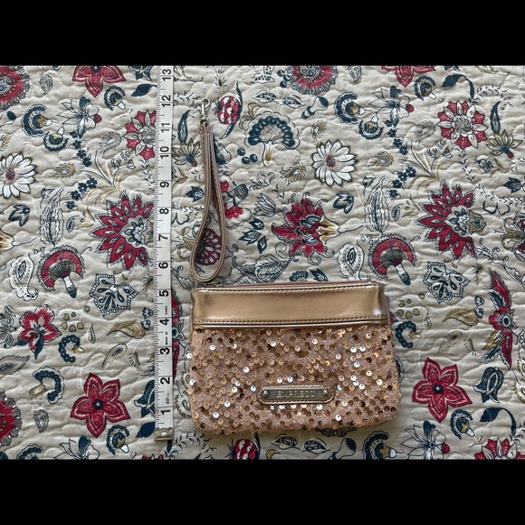 Express gold sequin clutch.